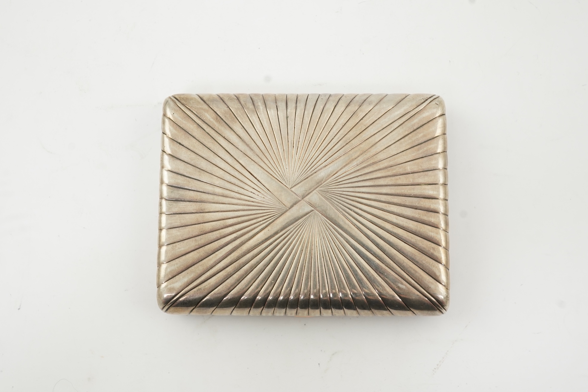 An early 20th century Russian 84 zolotnik silver cigarette case, with cappuccino agate inset cover, of ribbed rectangular form